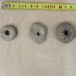 Over 100 perforated stones found in Israel suggested to be ancient spindle whorls in new research